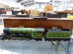 AN UNKNOWN 'O' GAUGE LOCOMOTIVE AND TENDER LNER 4-6-2 NO. 2597, IN WOODEN TRANSIT BOX.