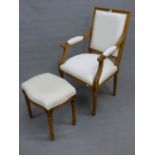AN OAK FLUTED SHOW FRAME ELBOW CHAIR AND MATCHING STOOL, THE TAPERING CYLINDRICAL LEGS ON SPINDLE