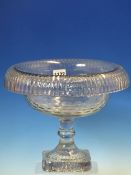 AN IRISH CUT GLASS BOWL WITH TURNOVER RIM, FACET CUT BOWL ON MOULDED KNOPPED STEM AND STAR SQUARE