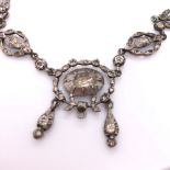 AN ANTIQUE CONTINENTAL SILVER AND PASTE STONE LAVALIER STYLE NECKLET, LENGTH 40cms, TOGETHER WITH