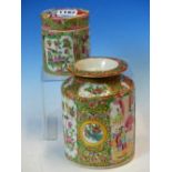 TWO CANTON CYLINDRICAL JARS AND COVERS PAINTED WITH ALTERNATING FIGURE AND GARDEN RESERVES. H 14 AND