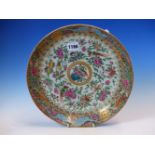 A 19th C. CANTON DISH, THE CENTRAL GOLD FRAMED ROUNDEL ENCLOSED BY BIRDS, BUTTERFLIES AND FLOWERS,