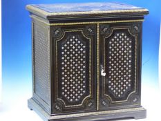 A 19th.C. EBONY BOULLE COLLECTORS CABINET INLAID IN BRASS AND MOTHER OF PEARL WITH A DIAPER OF CROSS