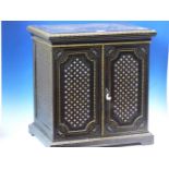 A 19th.C. EBONY BOULLE COLLECTORS CABINET INLAID IN BRASS AND MOTHER OF PEARL WITH A DIAPER OF CROSS