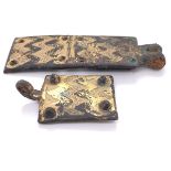 A MEDIAEVAL BRONZE TWO PLATE BUCKLE AND A SINGLE PLATE STRAP END OR PENDANT, EACH PLATE WITH PAIRS