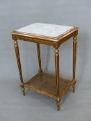 A FRENCH WHITE MARBLE TOPPED GILT WOOD SIDE TABLE WITH A CANED TIER JOINING THE FLUTED LEGS