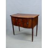 A RGENCY MAHOGANY SIDEBOARD, THE TWO DRAWERS CENTRAL TO THE BOW FRONT WITH LION MASK AND RING