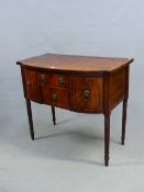 A RGENCY MAHOGANY SIDEBOARD, THE TWO DRAWERS CENTRAL TO THE BOW FRONT WITH LION MASK AND RING