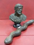 A COPPER ALLOY HEAD OF CHRIST CROWNED WITH THORNS AND ON EBONISED SOCLE BASE. H 27cms. TOGETHER A