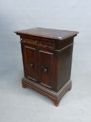 AN 18th C. AND LATER ITALIAN WALNUT SIDE CABINET WITH A DRAWER ABOVE TWO DOORS ENCLOSING SHELVES ABO