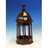 A TABLE BELL HOUSED WITHIN AN OCTAGONAL MAHOGANY CUPOLA. H 37cms.