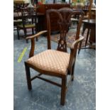 A SET OF EIGHT MAHOGANY CHIPPENDALE TASTE DINING CHAIRS INCLUDING TWO WITH ARMS, THE FOLIAGE CENTRED