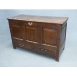 AN 18th C. OAK MULE CHEST, THE THREE PANELLED FRONT OVER TWO DRAWERS AND STILE FEET. W 120 x D 52