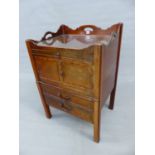 A GEORGE III MAHOGANY BEDSIDE TABLE, THREE HANDLES PIERCED THROUGH THE GALLERIED TOP ABOVE A SHALLOW