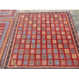 AN EASTERN HANDWOVEN MIXED METHOD CARPET. 202 x 202cms.