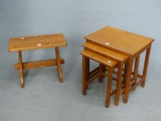 A NEST OF THREE AND ANOTHER OAK TABLE, EACH WITH ADZED RECTANGULAR TOPS, THE NEST WITH CHAMFERED