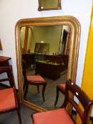A PAIR OF FRENCH 19th.C. RECTANGULAR MIRRORS WITH ROUNDED TOP CORNERS WITHIN GILT FRAMES INCISED