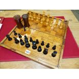 A STAUNTON BOX AND EBONY CHESS SET, THE KINGS. H 8.5cms. A PAIR OF TURNED WOOD DICE SHAKERS, ALL