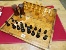 A STAUNTON BOX AND EBONY CHESS SET, THE KINGS. H 8.5cms. A PAIR OF TURNED WOOD DICE SHAKERS, ALL