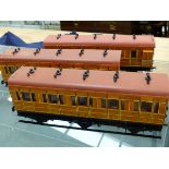 UNKNOWN. A RAKE OF SEVEN GAUGE 1 GNR TRAIN COACHES (7).