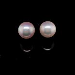 A PAIR OF CULTURED PEARL STUDS, WITH 18ct GOLD FITTINGS, PEARL SIZE APPROX 9mm. WEIGHT 2.6grms.