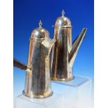 A PAIR OF GUILD OF HANDICRAFTS HALLMARKED SILVER SIDE HANDLE COFFEE AND HOT WATER POTS DATED 1965