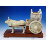 AN EARLY CHINESE POTTERY FIGURAL GROUP OF COW AND CART. POSSIBLY TANG DYNASTY. H. 30cm.