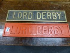 A BRONZE NAME PLATE LORD DERBY TOGETHER WITH THE RED PAINTED WOOD CASTING MAQUETTE. W 48 x 10cms.