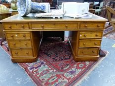 A 19th.C. OAK PEDESTAL DESK, THE LEATHER INSET TOP OVER THREE DRAWERS, THREE FURTHER TO EACH PEDEST