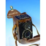 A LEATHER CASED BABY ROLLEIFLEX TWIN LENS CAMERA, No. 149027, POSSIBLY THE 4RF MODEL, WITH 1:2.8 F=
