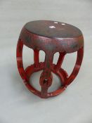 A CHINESE RED LACQUER DECORATED BARREL FORM STOOL. 45cm (H).