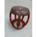 A CHINESE RED LACQUER DECORATED BARREL FORM STOOL. 45cm (H).