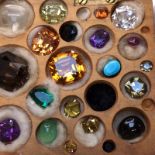 A COLLECTION OF NAIVELY CASED VARIOUS GEMSTONES AND MINERALS.