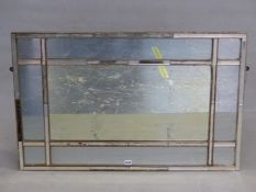 A 19th C. MULTIPLE PLATE RECTANGULAR MIRROR, THE DIVISIONS DEFINED BY RAISED GLASS PLATES WITHIN