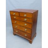 A GEORGIAN OAK CHEST OF TWO SHORT AND FOUR GRADED DRAWERS, EACH EDGED WITH MULTIPLE LINE INLAY