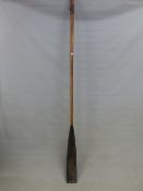 AN 1880 TRINITY HALL OAR FROM THE LADIES CHALLENGE PLATE AT HENLEY, THE BLACK BLADE WITH THE NAMES