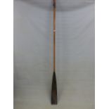 AN 1880 TRINITY HALL OAR FROM THE LADIES CHALLENGE PLATE AT HENLEY, THE BLACK BLADE WITH THE NAMES