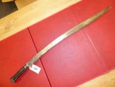 A TURKISH YATAGHAN, THE HORN HANDLE DECORATIVELY ATTACHED TO THE SINGLE EDGED BLADE, THE OVERALL