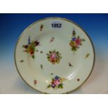 A NANTGARW PLATE PAINTED WITH FLOWER BUNCHES AND SPRIGS WITHIN A GILT DENTAL RIM, IMPRESSED MARK.