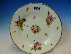 A NANTGARW PLATE PAINTED WITH FLOWER BUNCHES AND SPRIGS WITHIN A GILT DENTAL RIM, IMPRESSED MARK.