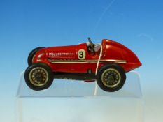 A SCHUCO CLOCK WORK TIN PLATE RED SPORTS CAR, A DIE CAST BENTLEY GT 2002 AND A HAROLD FLORY