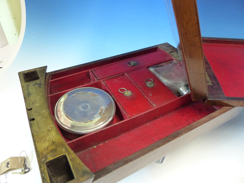 A ROSEWOOD GENTLEMANS CAMPAIGN TRAVEL BOX, THE INSIDE OF THE LID WITH RED SCRIM BACKED MIRROR - Image 10 of 17