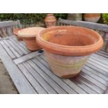 THREE TERRACOTTA GARDEN POTS, THE LARGEST AND SMALLEST. Dia. 50 AND 24cms. RESPECTIVELY