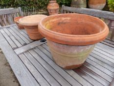 THREE TERRACOTTA GARDEN POTS, THE LARGEST AND SMALLEST. Dia. 50 AND 24cms. RESPECTIVELY