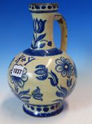 AN 18th/19th C. CENTRAL EUROPEAN BLUE AND WHITE TIN GLAZED EWER PAINTED WITH TULIPS AND OTHER