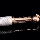 A 9ct GOLD AND ENAMEL PROPELLING PENCIL ENGRAVED FROM G.F.L TO QUEENIE 1898, CONTAINED IN AN ANTIQUE