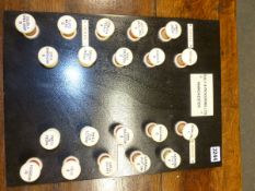 A DALY AND PICKERING MANCHESTER EBONISED BOARD OF TWENTY IVORY ORGAN STOPS, THE BOARD. 43 x 31.