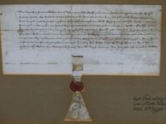 A FRAMED QUIT DEED RELATING TO LAND IN NORTH WALES DATED 10TH AUGUST 1411 AND TIED WITH A RED WAX