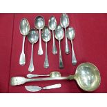 A COLLECTION OF GEORGIAN,VICTORIAN AND LATER SERVING SPOONS, LADLES, BASTING SPOONS ETC, GROSS