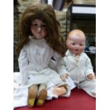 TWO ARMAND MARSEILLE BISQUE HEADED DOLLS, THE 390. H 66cms. AND MY DREAM BABY. H 55cms.
